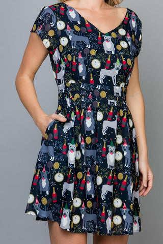 Cap Sleeve Dress with pockets and tie back in navy detail view