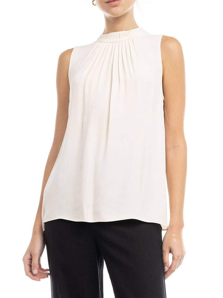 torso of woman wearing a sleeveless white blouse with pintuck detail