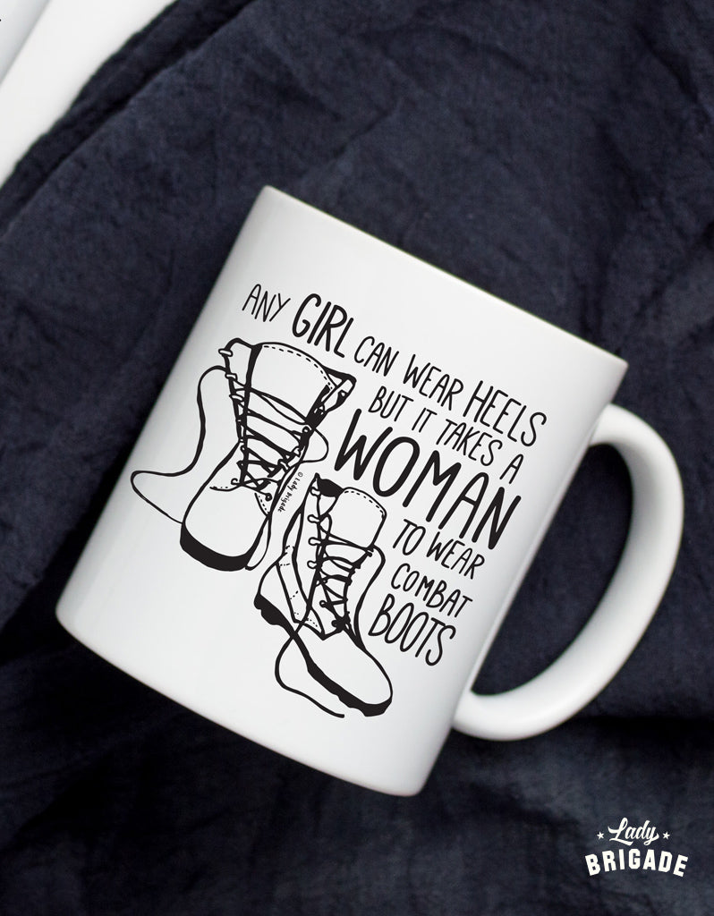 coffe mug with any girl can wear heels but it takes a woman to wear combat boots logo